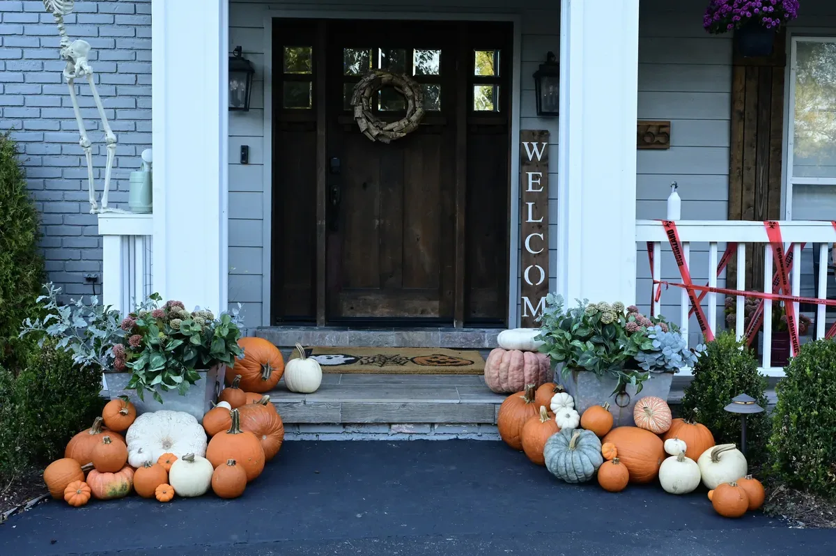 The Sprout fall porch pumpkin display by Detroit Pumpkin Company